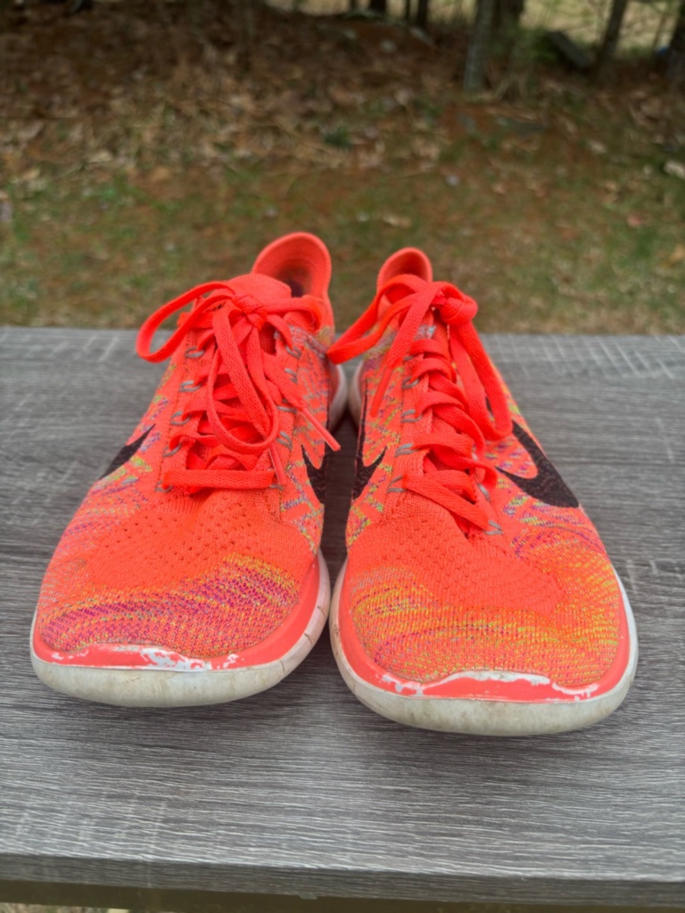 Nike Women's Bright Orange Flyknit Athletic Sneakers